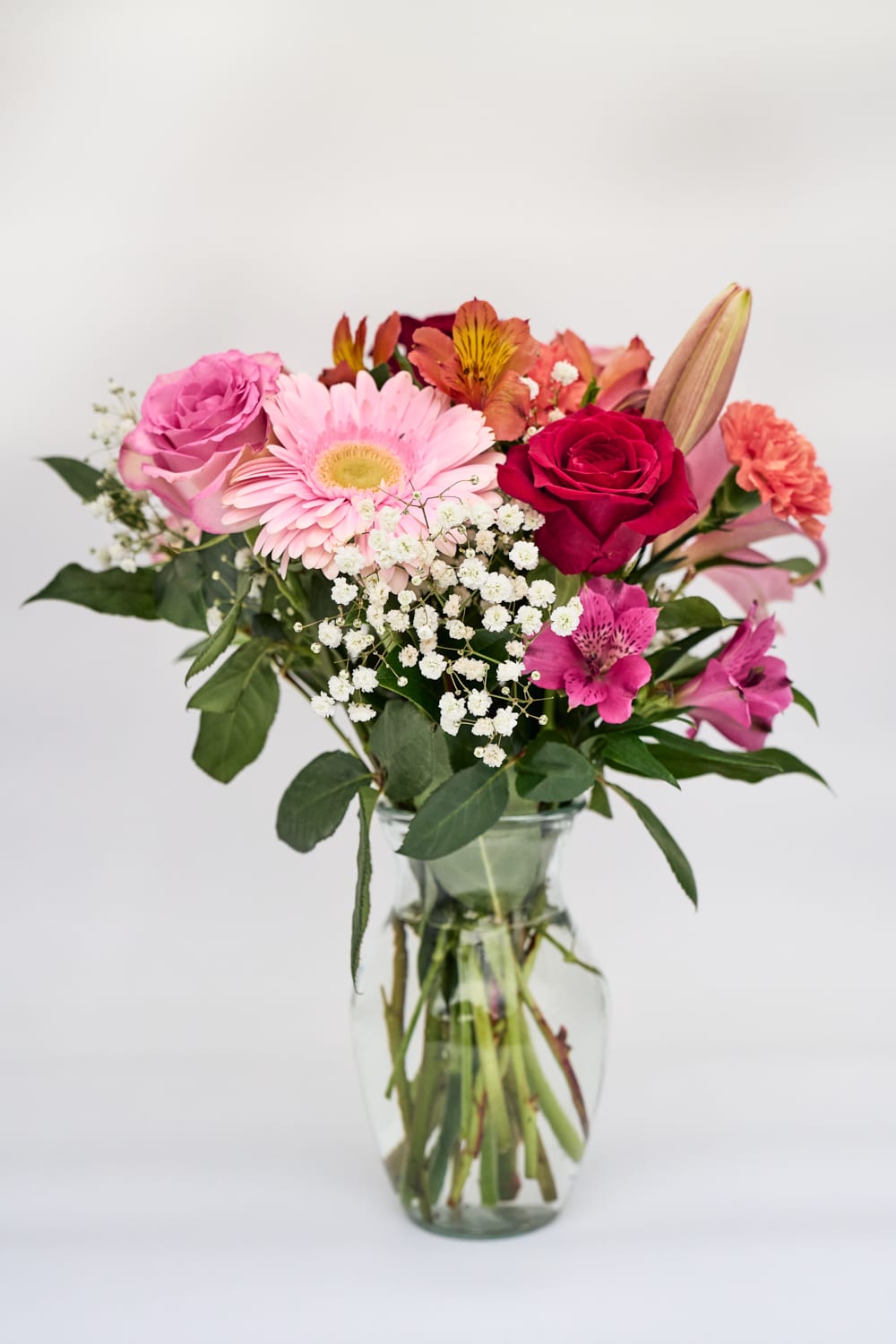 Florist's Choice - Colorful Arrangement - A colorful assortment of seasonal flowers filled to value by our expert florists. Leave it to us to choose the freshest available flowers for you! Flowers and colors will vary depending on season and availability.