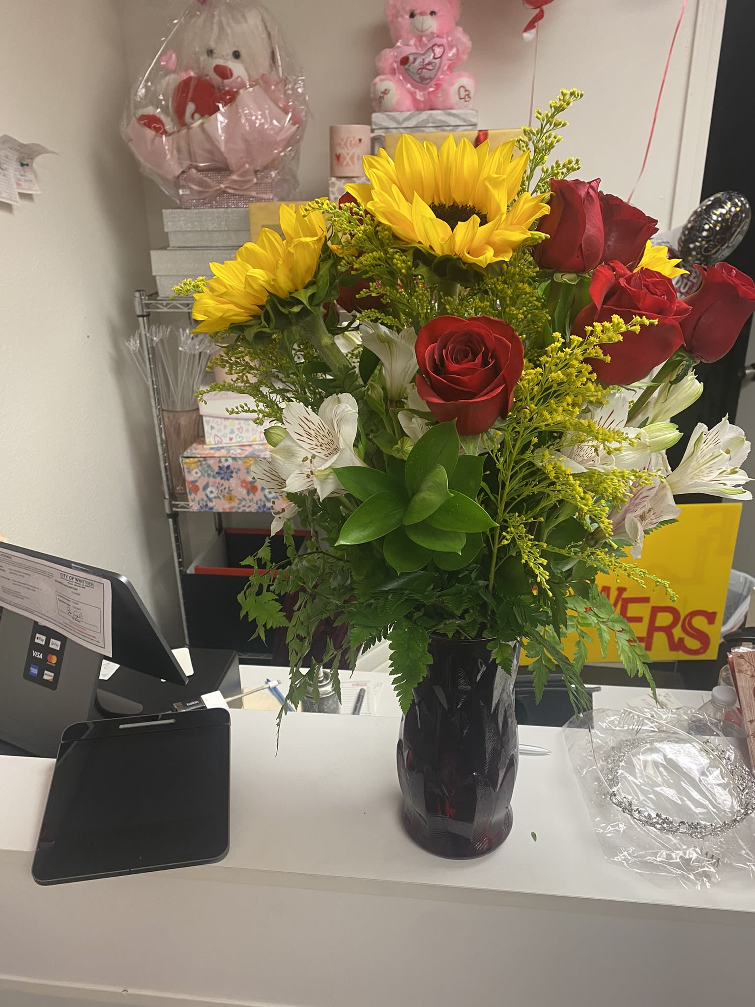 Sunflowers and roses makes anybody smile - Roses and sunflowers with lush greens sets this one apart and makes it so very special