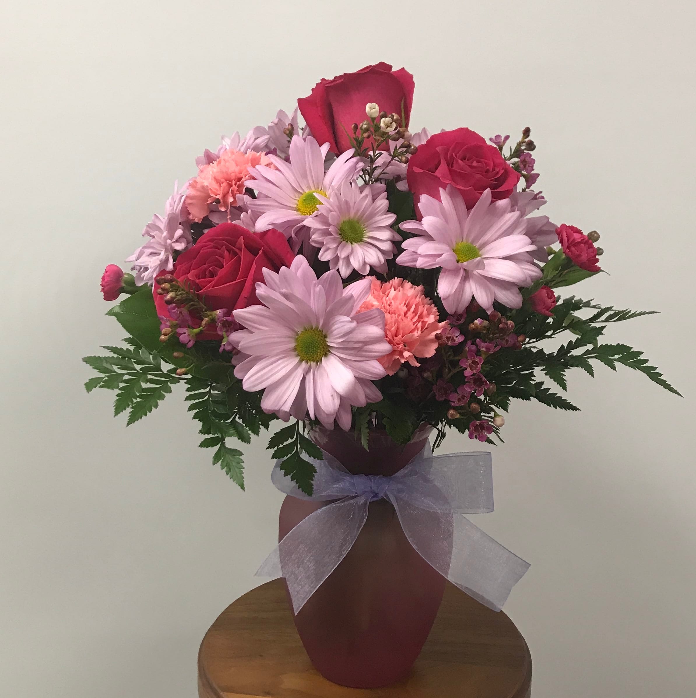Laughter and Love - A combination of pinks and purples in a complementary vase.
