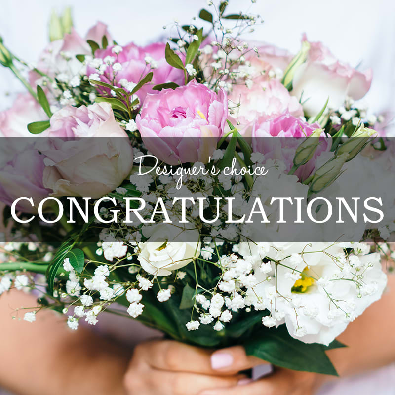Designer's Choice - Congratulations - Let our talented designers create something beautiful and unique for you! We'll use the best flowers available and tailor the design to your occasion and recipient. 
