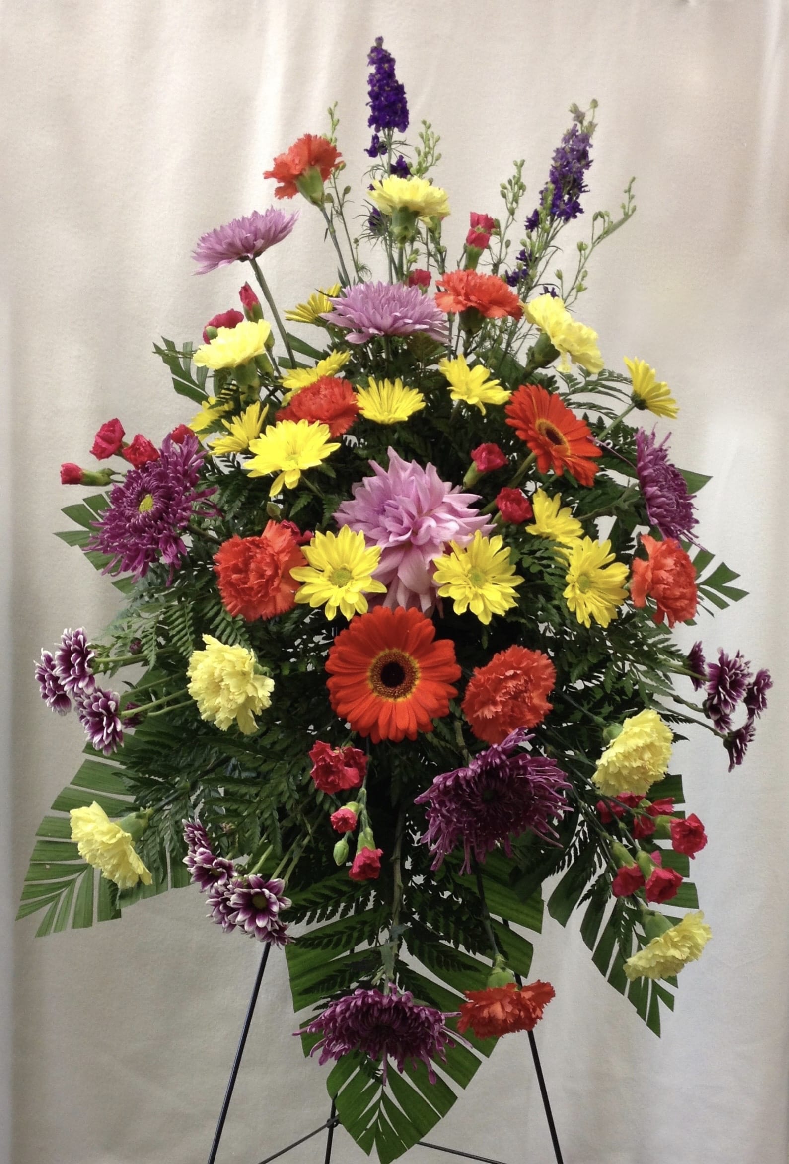  A Bright Life - A bright mix of blooms evoke a celebration of a life well lived. Orientation: One-Sided 