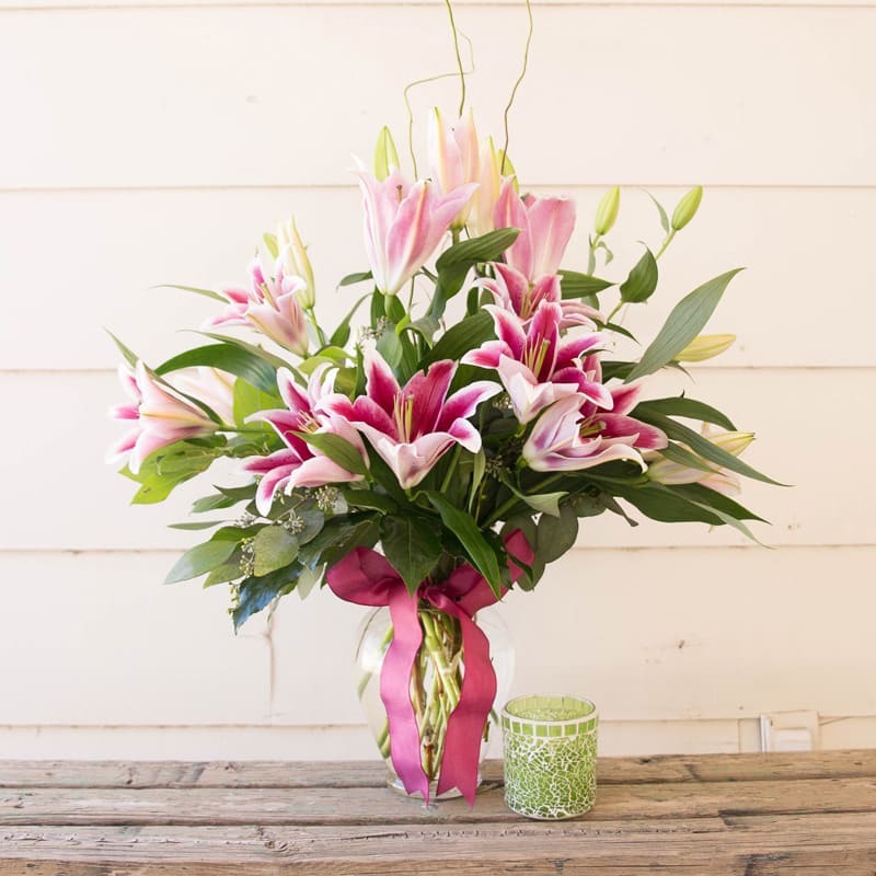 Lilies - Star Gazer lilies with a big pink bow