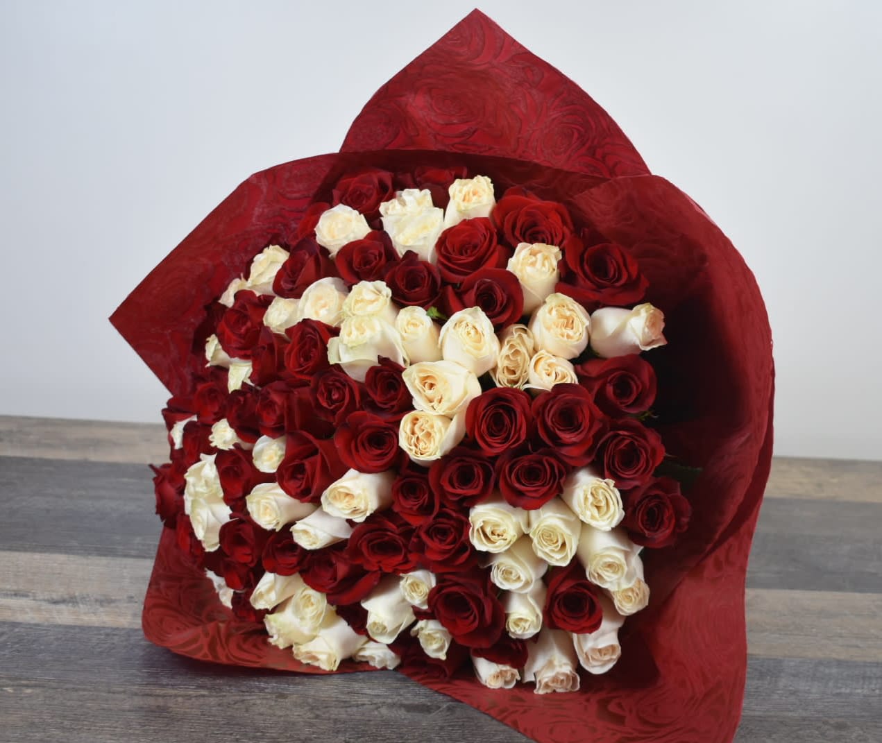 100 Red & White Roses By La Floral Designs