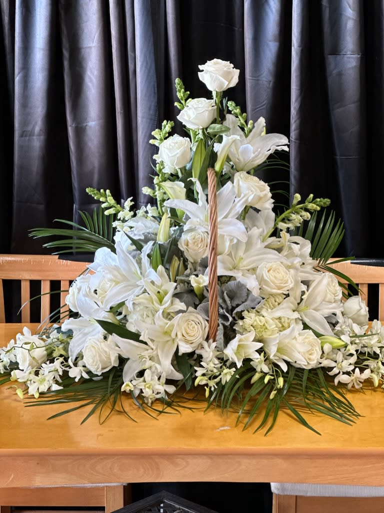 Fireside Basket - A classic funeral arrangement suitable for both a funeral service and the home. Customizable in a variety of colors.