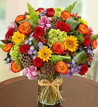 Martini Bouquet Pumpkin Spice - Product ID: 99060  EXCLUSIVE Our fresh take on the popular cocktail gets shaken up with a new recipe! Rich roses, lilies, mini carnations and more are hand-arranged by our expert florists in an oversized keepsake martini glass. Add sweet cinnamon sticks and bronze crystal accents to really spice things up for birthdays, get-togethers or just because. Truly original Happy Hour arrangement of fresh roses, lilies, hypericum, mini carnations and salal, topped with cinnamon sticks Lilies may arrive in bud form and will open to full beauty over the next 2-3 days Hand-designed by our florists in an oversized acrylic martini glass filled with bronze crystal gel; glass measures 9&quot;H Extra large arrangement measures approximately 14.5&quot; H x 10&quot;L Large arrangement measures approximately 14&quot;H x 9&quot;L Medium arrangement measures approximately 13&quot;H x 9&quot;L Small arrangement measures approximately 13&quot;H x 8&quot;L Our florists select the freshest flowers available so colors, varieties and container may vary due to local availability