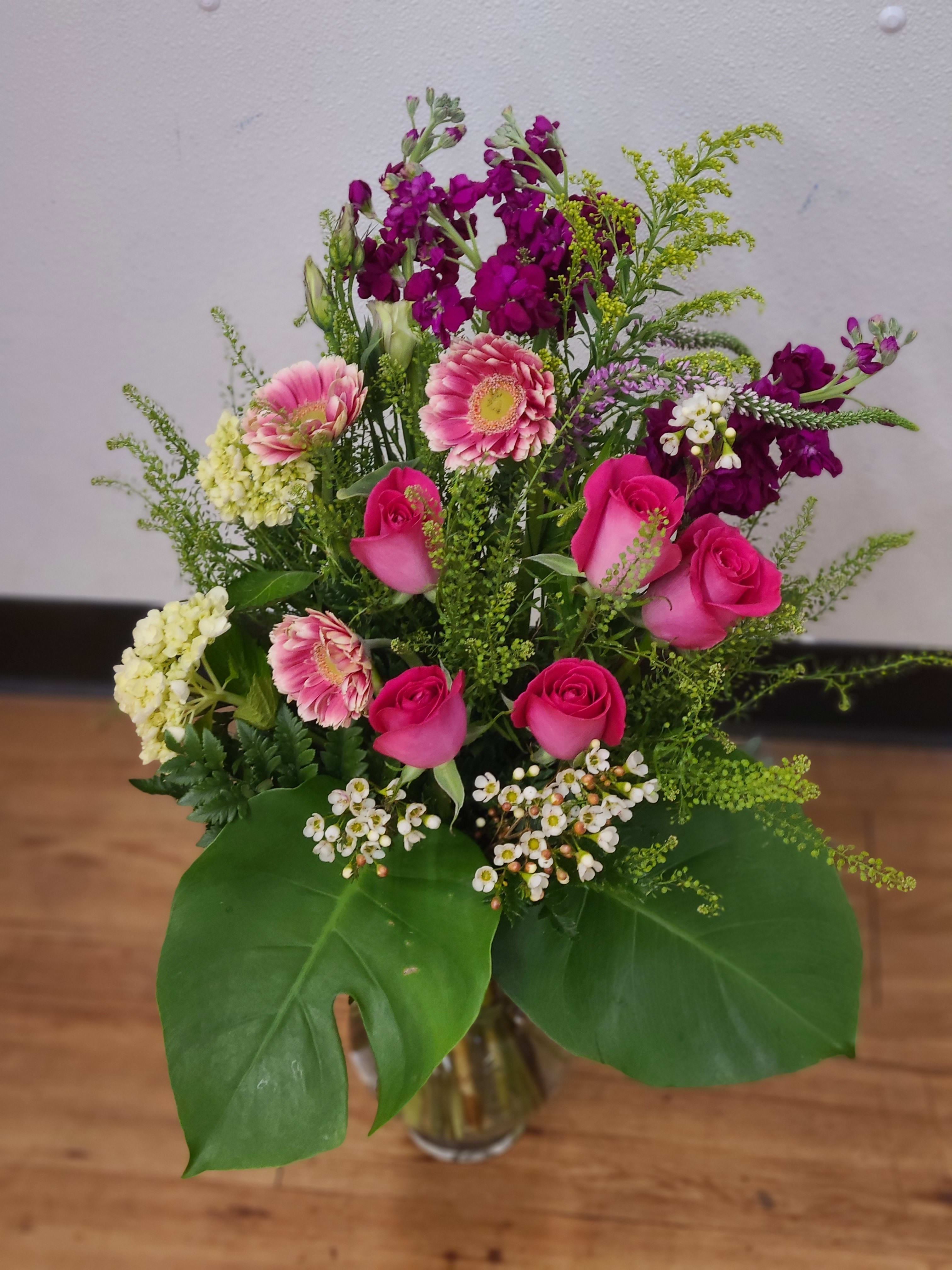Large Assorted Vase Arrangement (photo is of example ) by Flowers by Connie