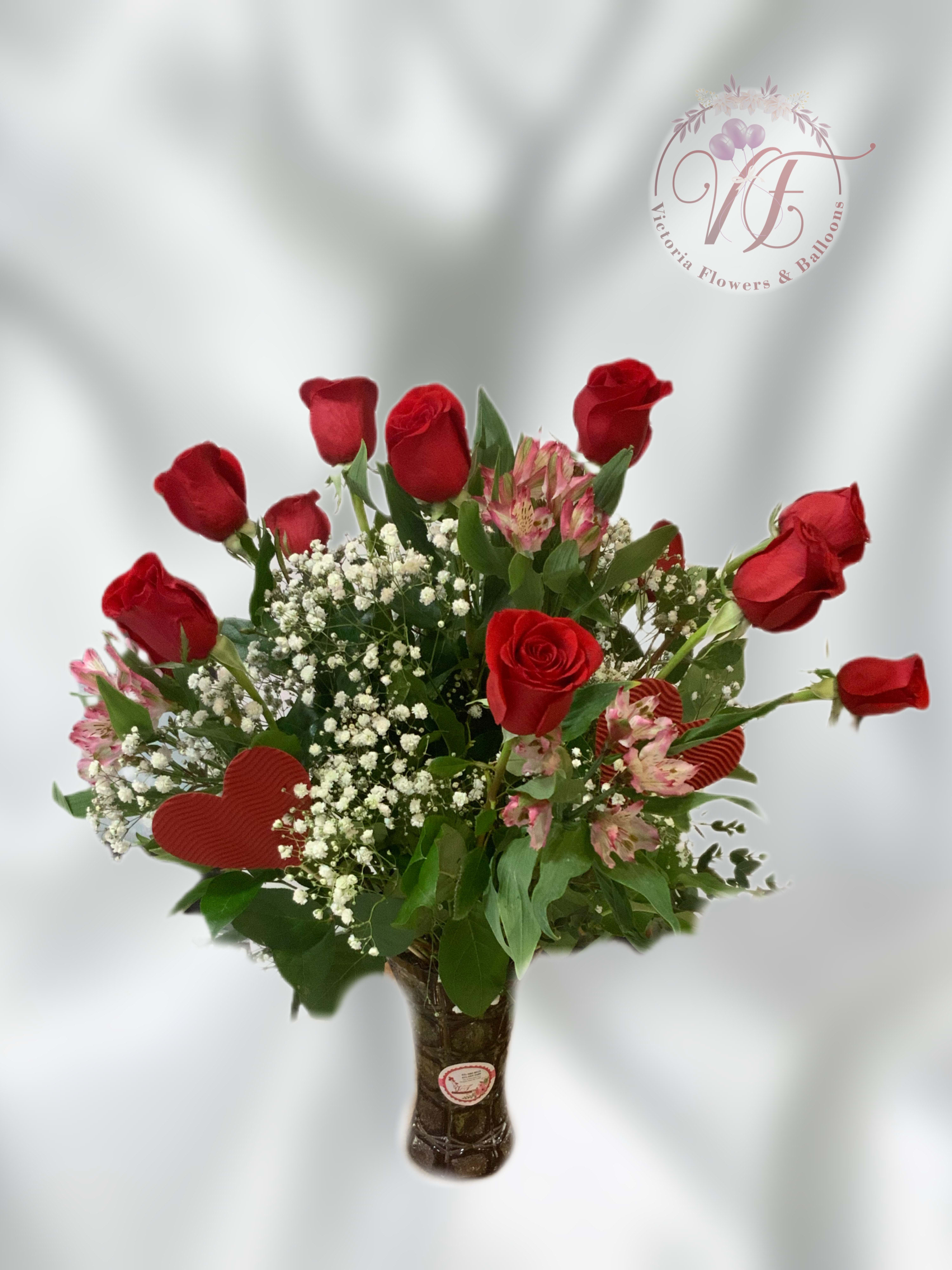Dozen Roses in a Vase by Victoria’s Flower Shop