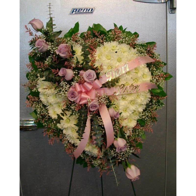 Flower Heart with White Pom Poms and Roses - A unique piece to remember a loved one! Please remember to tell us a color preference and what you would like on the ribbon ( Mom, Dad, Gram etc.) Product ID: standingheartfuneral 
