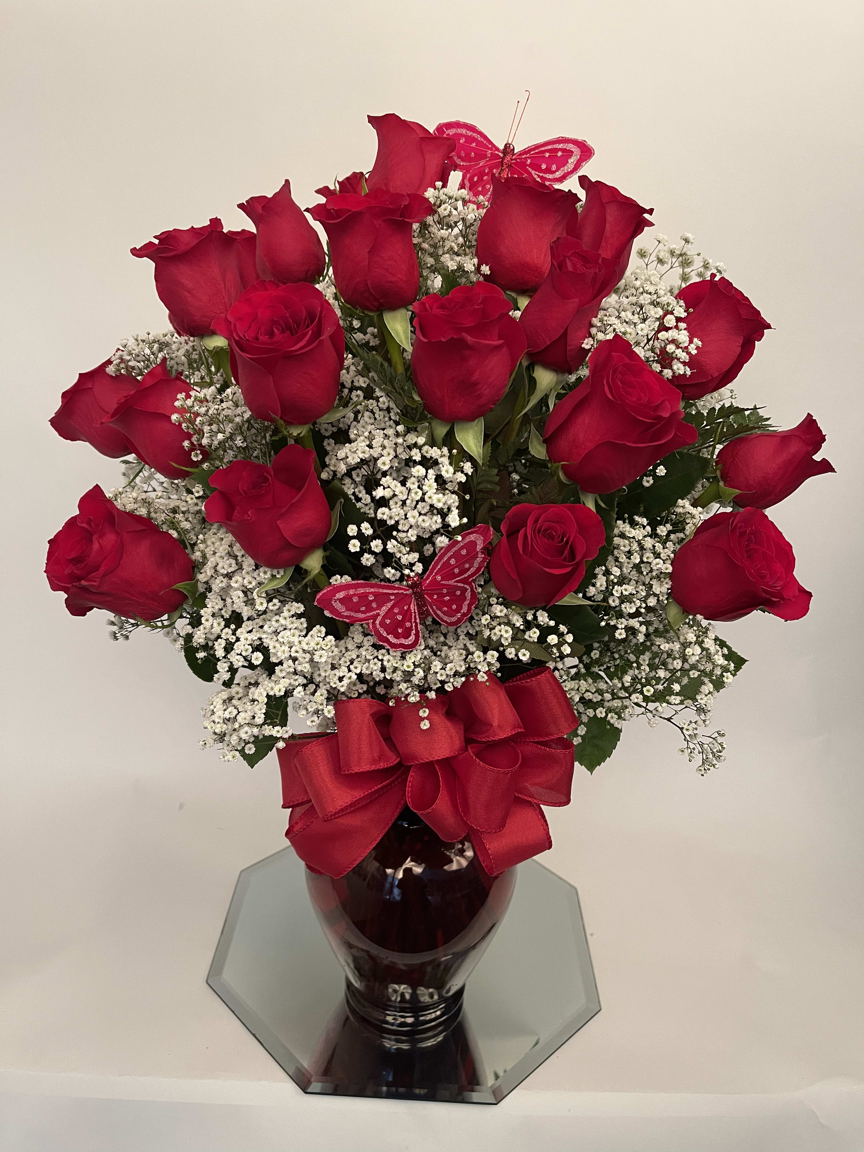 Two dozen red roses - Available in any color, let us know under “special instructions”