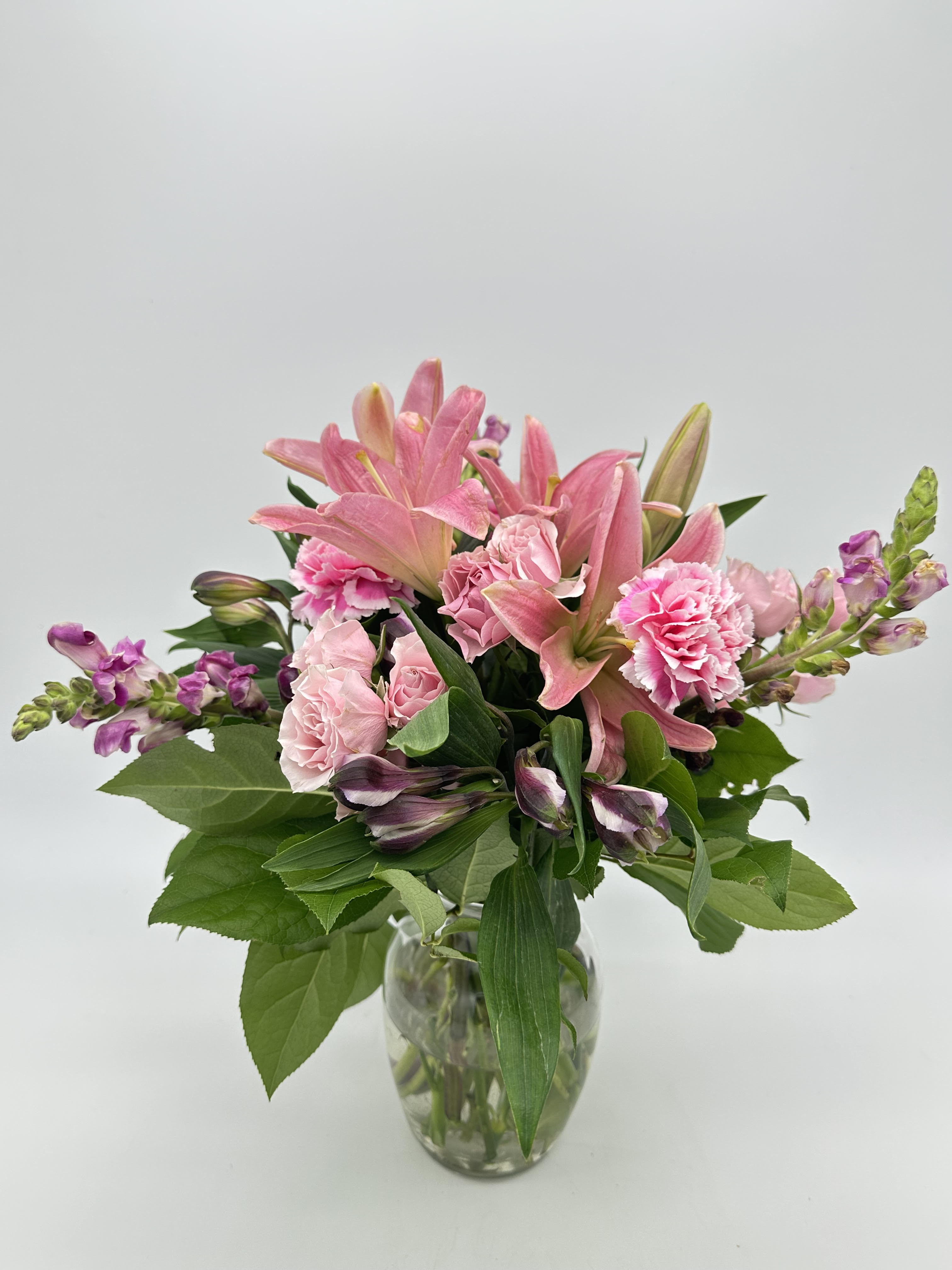 Floyd - Pink Lilies, spray roses, carnations, alstroemeria, and purple stalk
