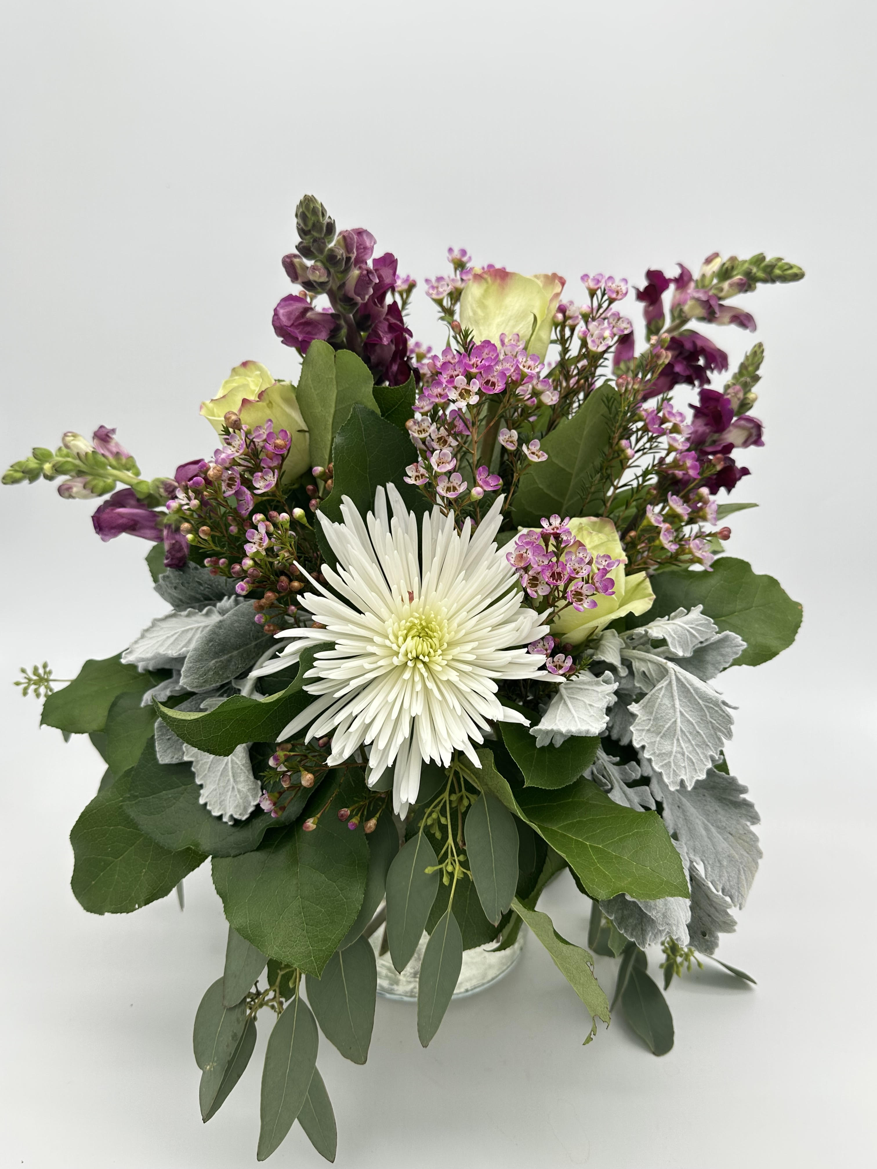 Sheree Sheree - White Roses, spider mums, Purple stock, Wax flower, eucalyptus, dusty miller, and lemon greens