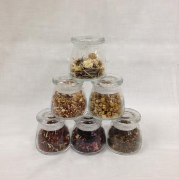 Tea Lovers Gift Box Tea Lovers Gift Box - 6 assorted teas in 1 oz glass air tight jar packaged in a wooden box with paper tea bags to make an easy cup of tea and a reusable tea strainer.