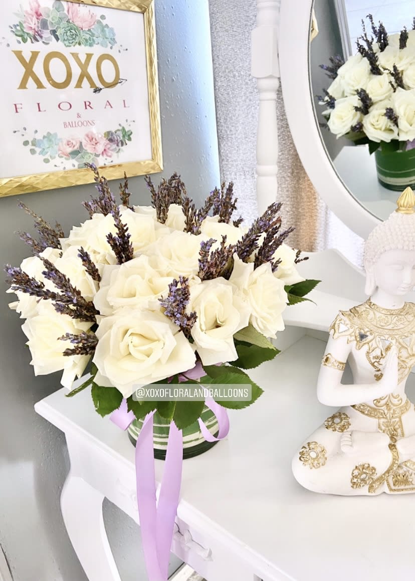 Lavender Sea Salt - Give to any special lady, the gift of ultimate relaxation with our incredible fresh lavender sea salt floral arrangement!!  This is the floral arrangement that gives your loved one more reasons to relax, with Fresh Pure Lavender and white roses. 