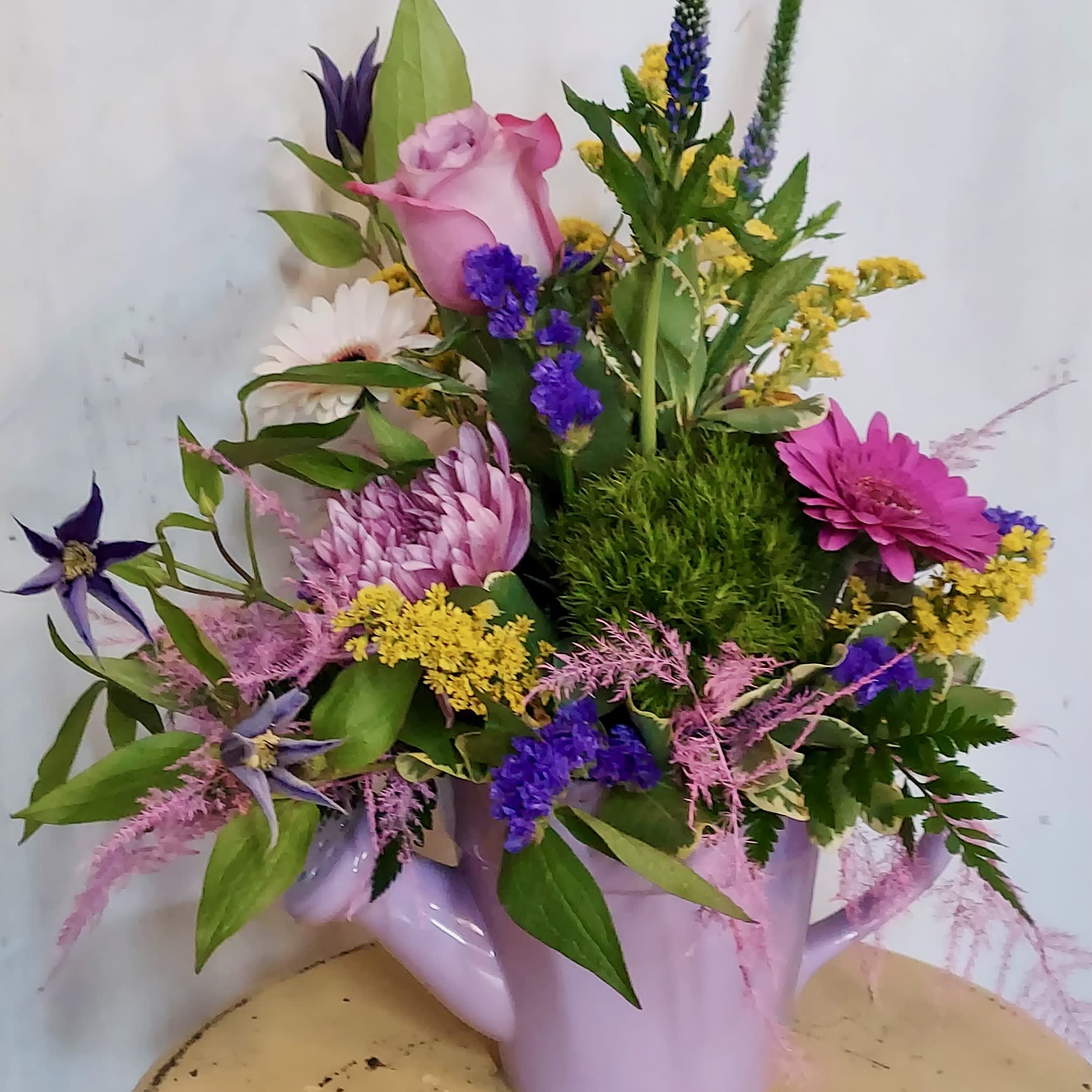 Spring Showers Spring Showers - We all know that Spring Showers bring beautiful flowers! This spectacular Sunnyside favorite is whimsical and yet a classic burst of spring. Certain to brighten anyone's cloudy day!