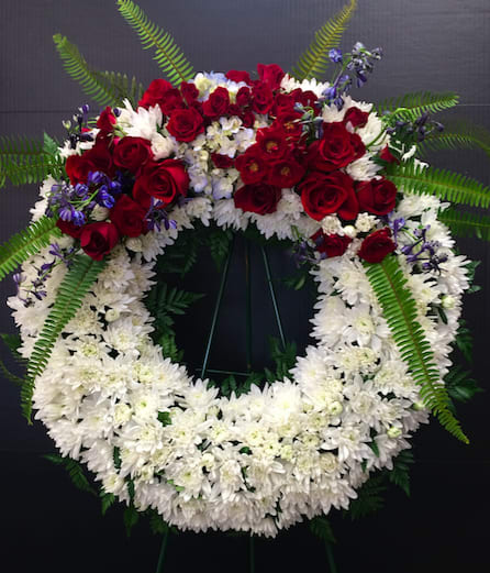 Serenity Wreath by Flower After Flower Serenity Wreath by Flower After Flower - A ring of fragrant, bright white blossoms will create a serene display at any funeral or wake. This classic wreath is delivered on an easel, and is a thoughtful expression of sympathy and admiration.