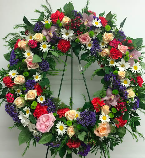 Sympathy wreath Sympathy wreath - Daisies, roses and mixed spring!