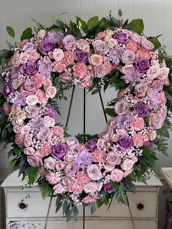 Rose Garden Heart Rose Garden Heart - A tender and classic tribute to a precious life. Heartfelt emotions and sympathies find delicate expression here.