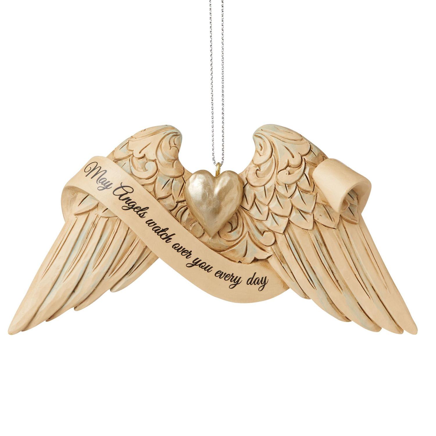 Jim Shore -  Guardian Angel Wings Ornament - These delicately sculpted handpainted angel wings share uplifting messages of faith when we need a reminder. Keep these wings close to remember to find comfort. This pair of Jim Shore angel wings shares a heartfelt message about guardian angels near.  Message: May Angels watch over you every day. Hanging Ornament 2.5in H Jim Shore Heartwood Creek Heavenly Messengers Ornaments hang on tree or on a stand in your home thoroughout the year Beautifully hand-painted and crafted from high-quality stone resin with intricate styling and attention to detail Beautiful Jim Shore Angel Wings share messages of love, hope and inspiration to lift our spirits and bring us peace. Packaged in window box 4.75 in L