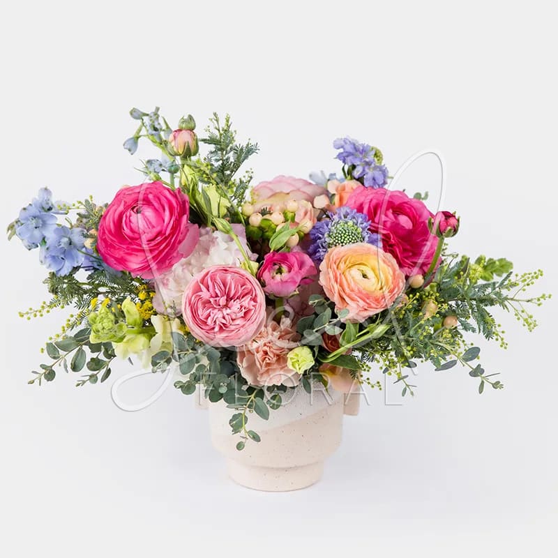 Pretty in Pastel - Oh so pretty! Dreamy pastel premium seasonal florals arranged in modern footed speckle vase. Perfect for someone who is both stylish, modern and fun! Milton Vase 5.5&quot; x4.5&quot;