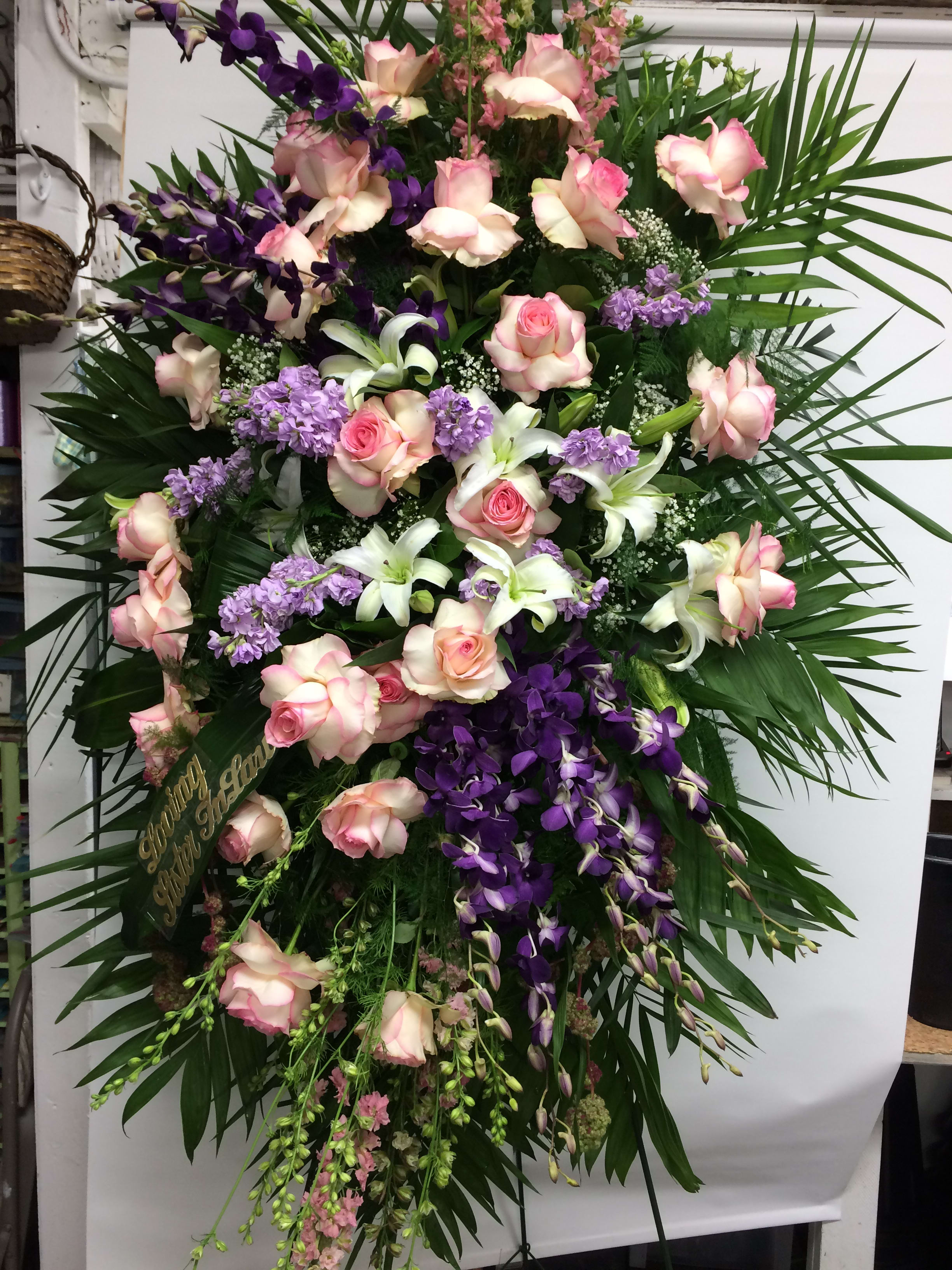 True Feelings True Feelings - A gorgeous array of lilies, exclusive princess roses, danrobium orchid, stock flower and green accents.
