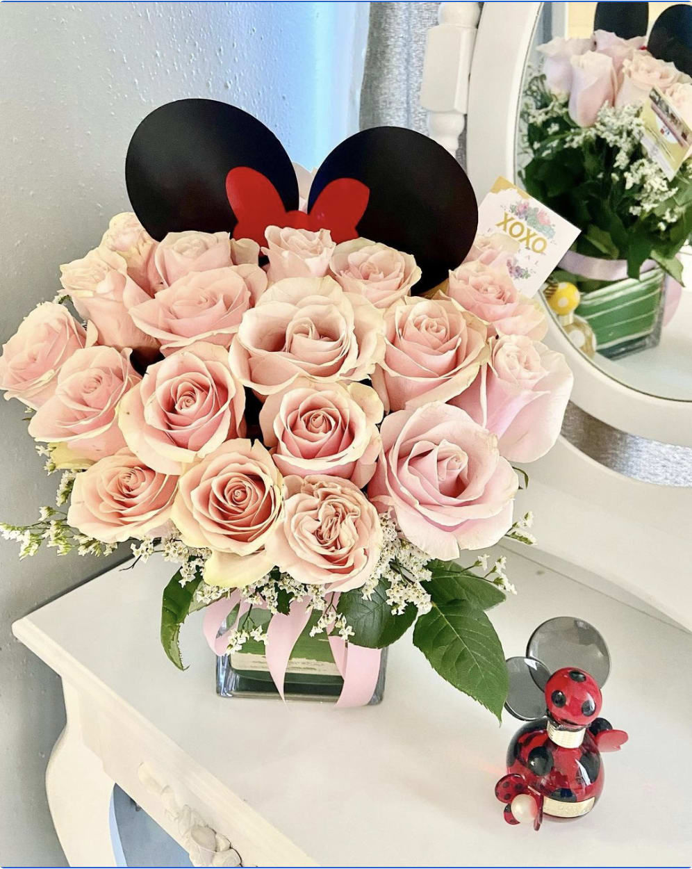 Simply ear... ear-esistible - Some people were just born with Disney in their veins!!! and this beautiful arrangement will bring happiness and fun to your loved one. Simply ear-esistible is all you need plus a pair of Minnie ears!    If you prefer to change colors or add colors please let us know in special instructions or you can send us a message to (714)360-5020 with your order number