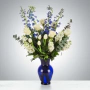 Orion's Belt by BloomNation™ - A blue and white arrangement featuring roses, tulips, and delphinium. Send this arrangement to anybody who likes stargazing or the night sky. A perfect gift to send for Hanukkah or the winter season.  Approximate Dimensions: 16&quot;D x 28&quot;H