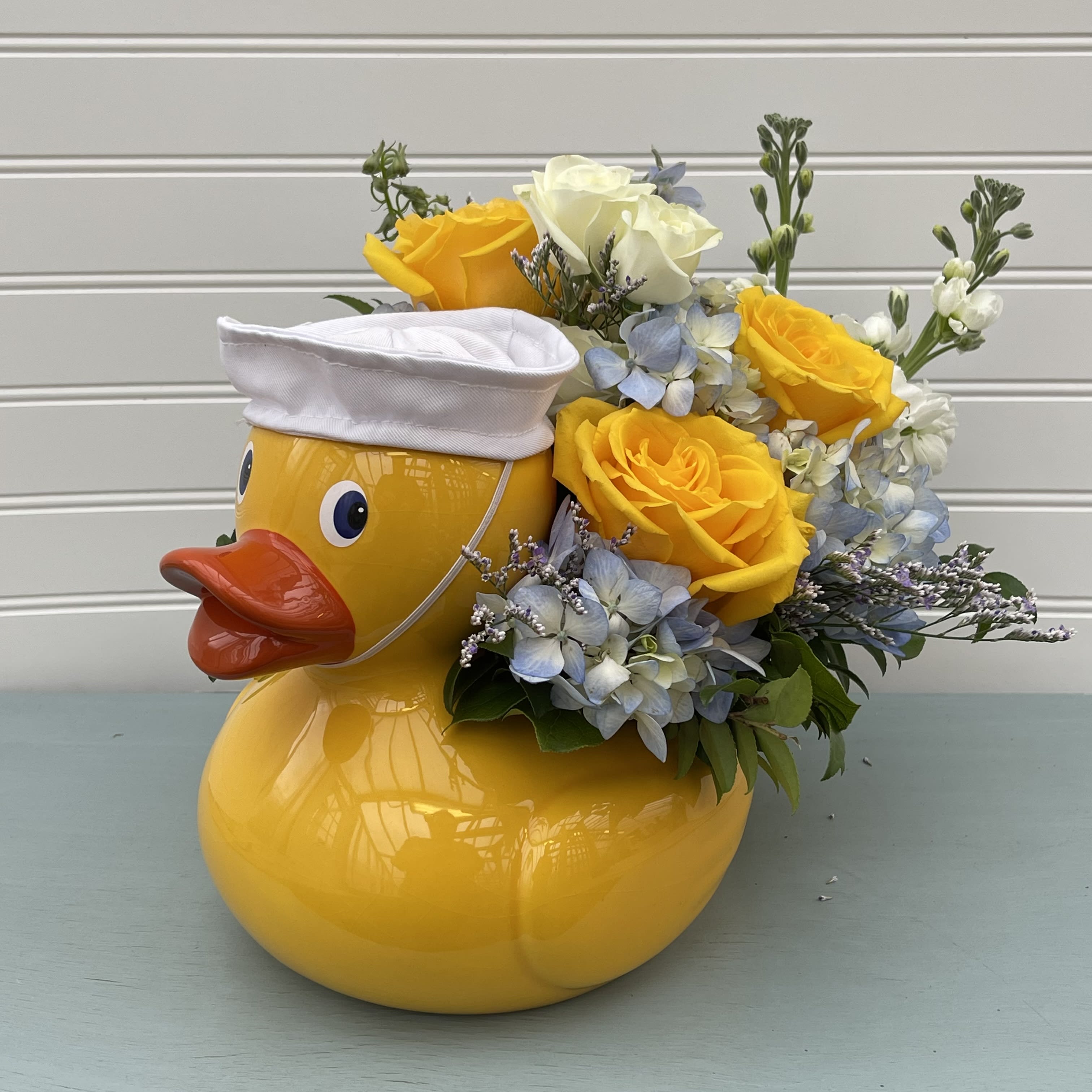 Donnie Ducky - Lucky duck! Make the new parents smile with this charming ceramic duck that mom will want to use later in the nursery.