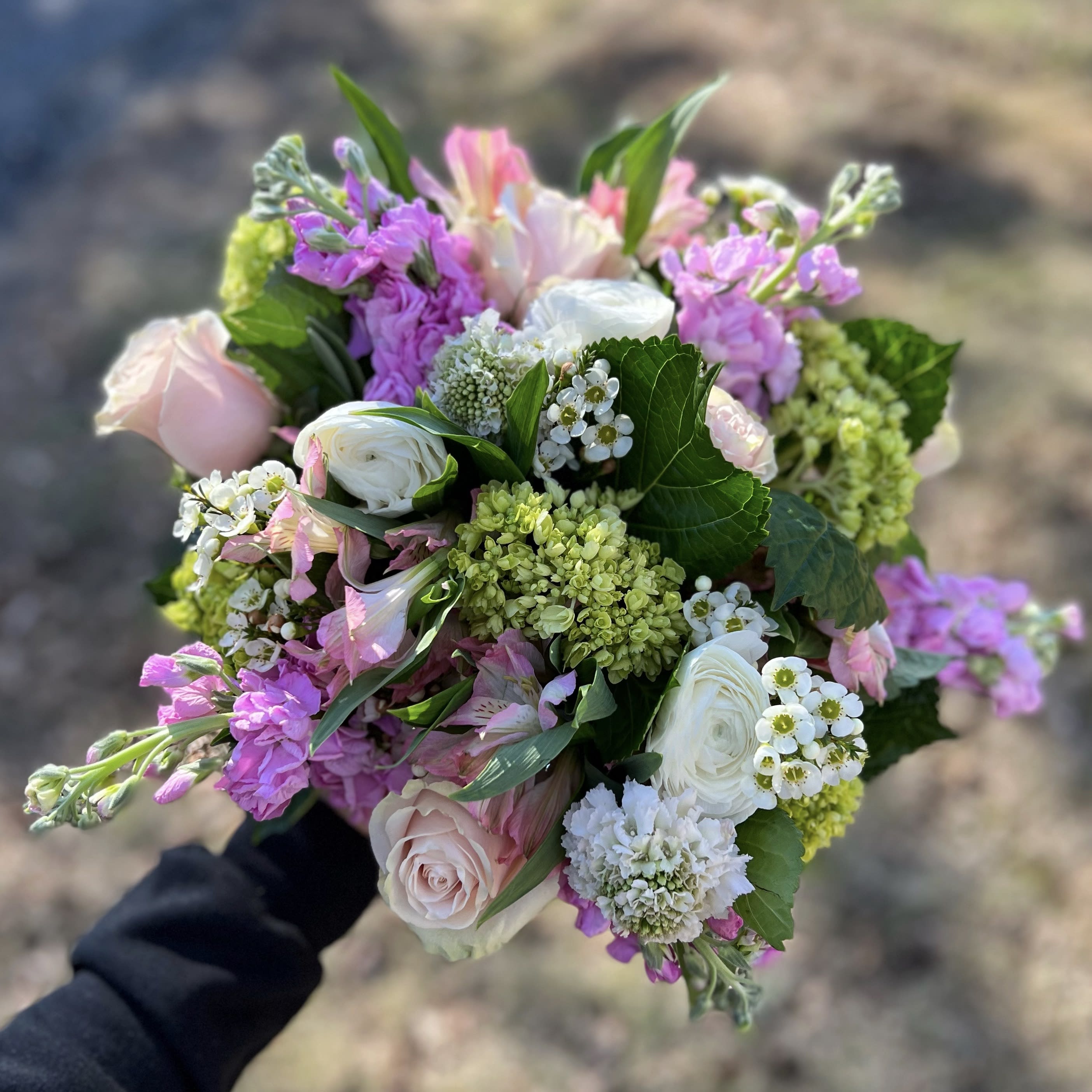 Pretty in Pink - Florist crafted bouquet with shades of pink. Design varies upon availability and sizing. Premium product is shown. The actual product may differ slightly to the photo but will match its size and theme.
