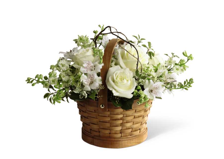 The FTD Peaceful Garden Basket - The FTD Peaceful Garden Basket offers warmth and comfort through its display of snow-white blooms. Roses, larkspur and Peruvian lilies are accented with curly willow tips and an assortment of lush greens. The bouquet is artfully arranged in a natural round woodchip basket, creating the perfect way to convey your wishes for peace and tranquility during this time of loss and sadness.