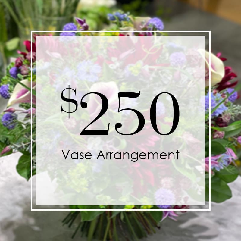 Custom vase Custom vase - Let our designers create a beautiful custom arrangement with the freshest flowers of the season!