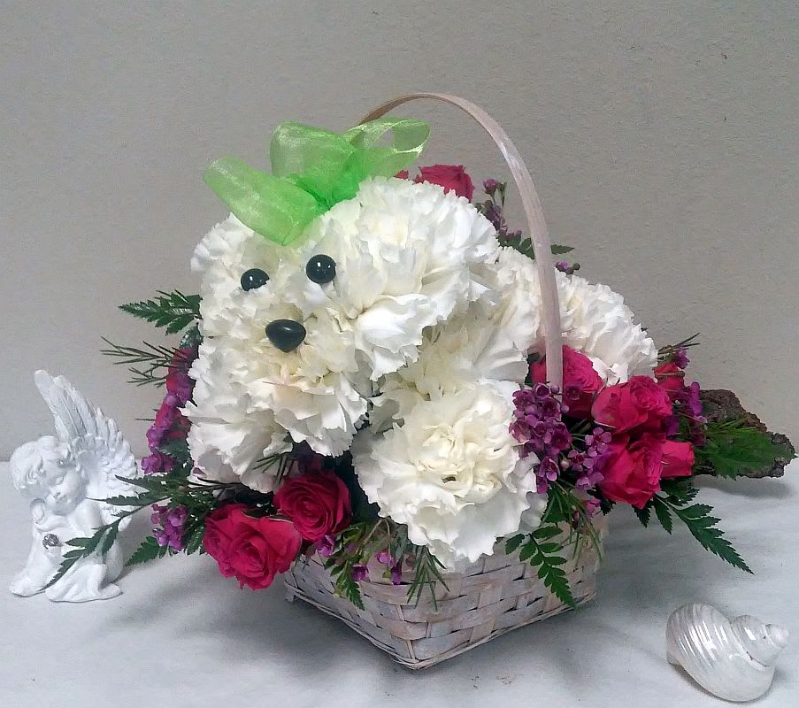 Precious Poodle - No one can resist the perky playfulness of this mum-and-pompon poodle in a basket. For dog-lovers everywhere!