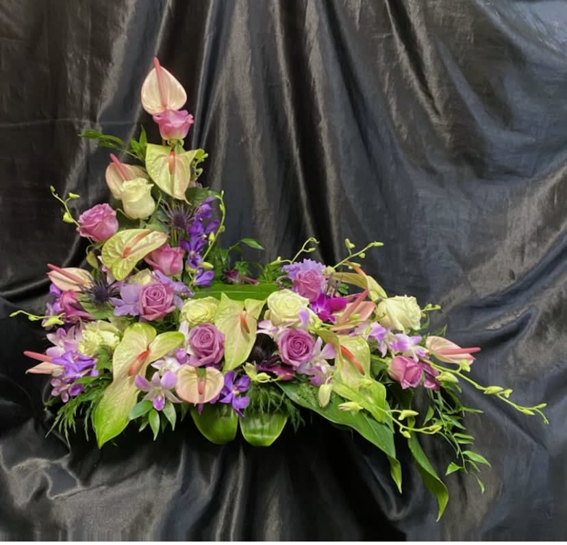 Anthuriums/Roses. URN GARDEN   # 4 - Purple &amp; white roses.  Green &amp; light pink anthuriums and orchids.  