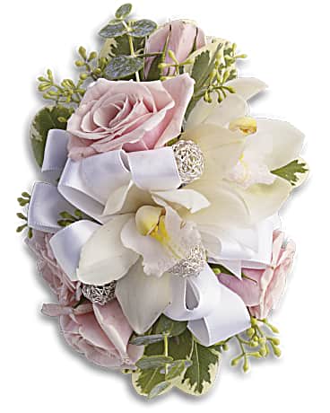 Pink Rose Corsage  - Light pink spray roses with white dendrobium orchids, seeded eucalyptus and variegated pittosporum. to any prom, formal, or wedding event. 