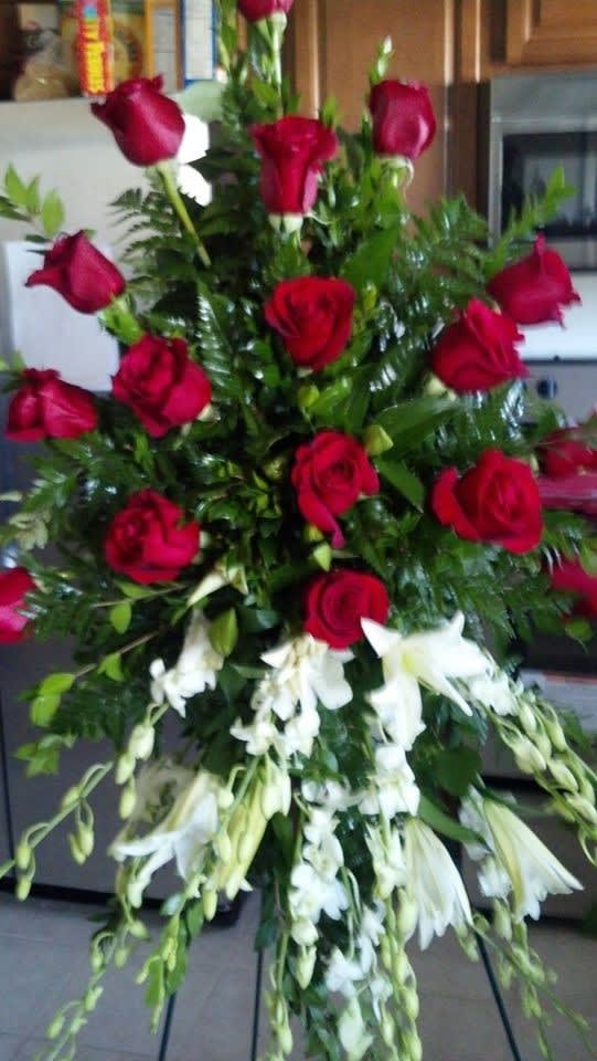 Rose Orchid Standing Spray Rose Orchid Standing Spray - Red roses with white orchids standing arrangement this arrangement can be designed using any color roses