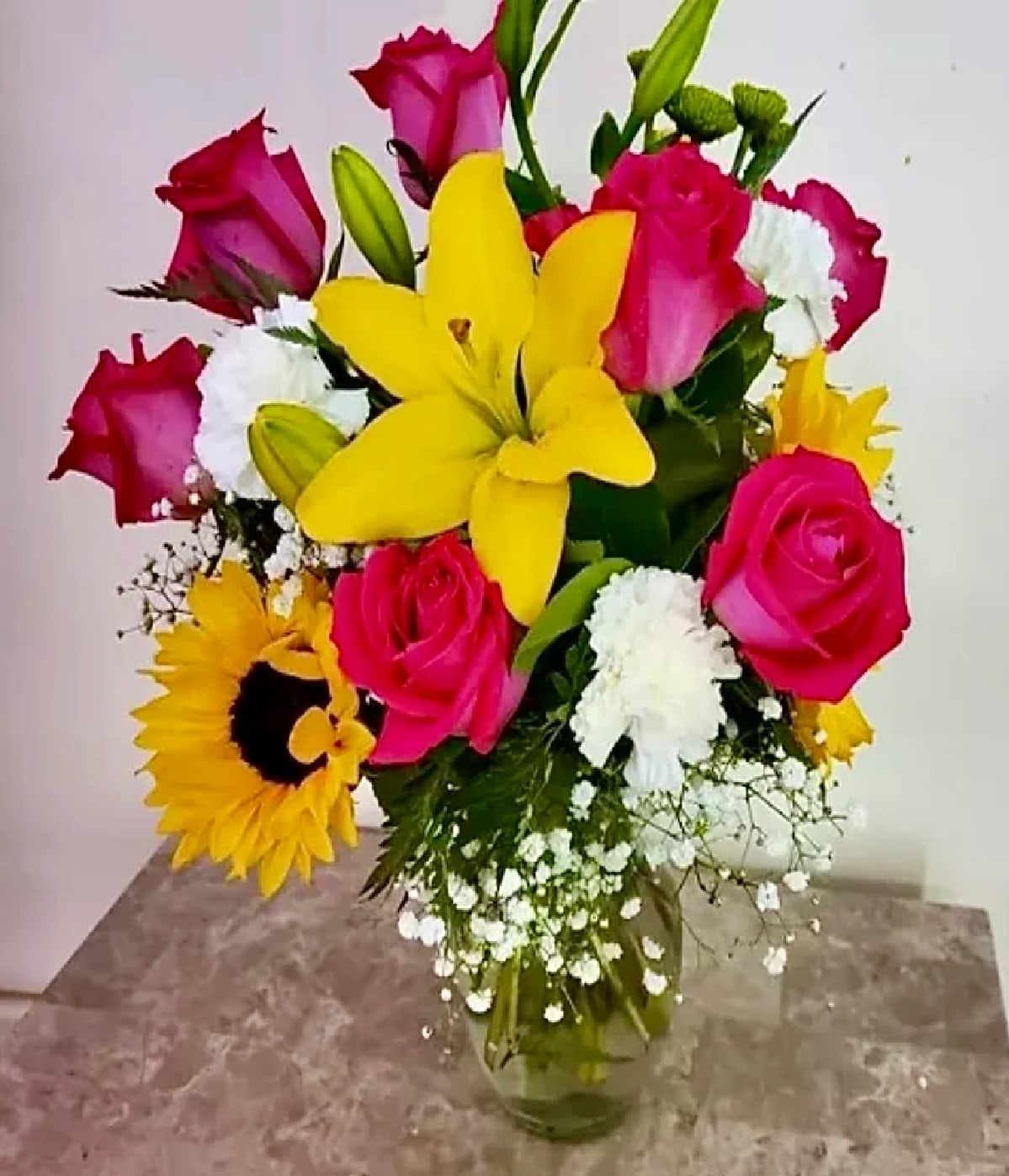 EVE 5 - DISCLAIMER  For green and blooming plants, similar plants may be substituted of equal or greater value. For flowers, we will make every attempt to match the flower type / color but may substitute with another color or type of flower. If the container/ vase shown online is not available, a similar container/ vase will be used. Bears or other gift items may be substituted as well.  Want to check on availability? If it makes you feel more comfortable about the purchase, then we encourage you to call or email us to check on the latest availability of certain products. We would be glad to give you the most current, up-to-date status on our inventory.