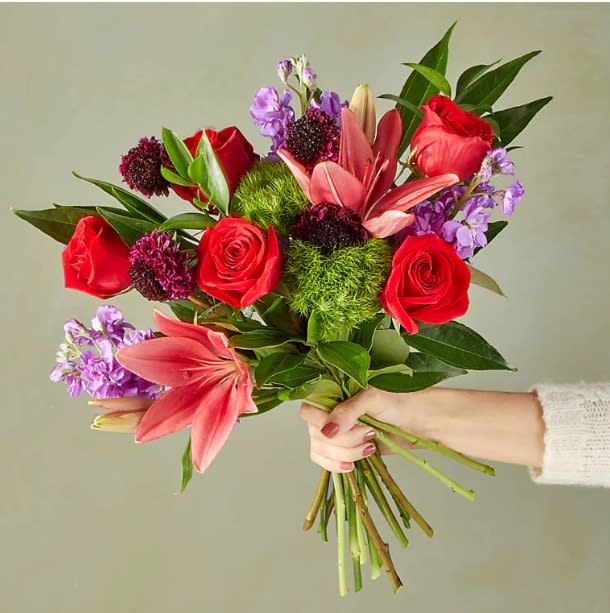 Purple Potion Bouquet - Mini calla and hybrid lilies mix with trick dianthus and scabiosas in this dashing and hypnotically elegant bouquet.  Please Note:The bouquet pictured reflects our original design for this product. While we always try to follow the color palette, we may replace stems to deliver the freshest bouquet possible.