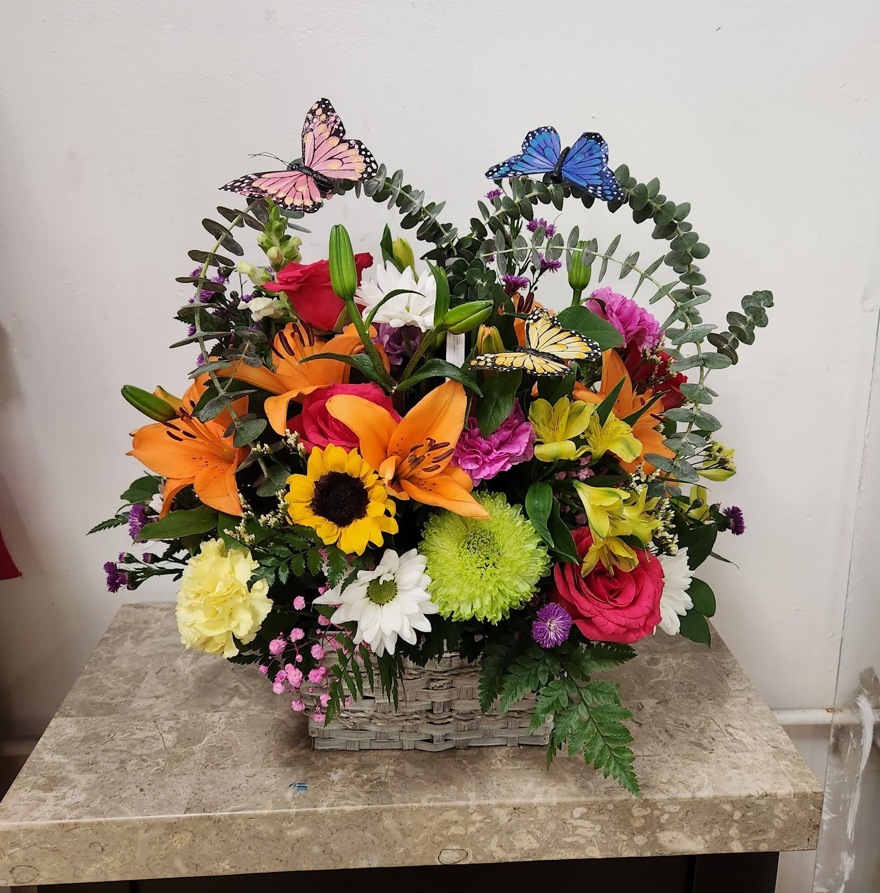 EVE 64 - DISCLAIMER  For green and blooming plants, similar plants may be substituted of equal or greater value. For flowers, we will make every attempt to match the flower type / color but may substitute with another color or type of flower. If the container/ vase shown online is not available, a similar container/ vase will be used. Bears or other gift items may be substituted as well.  Want to check on availability? If it makes you feel more comfortable about the purchase, then we encourage you to call or email us to check on the latest availability of certain products. We would be glad to give you the most current, up-to-date status on our inventory.