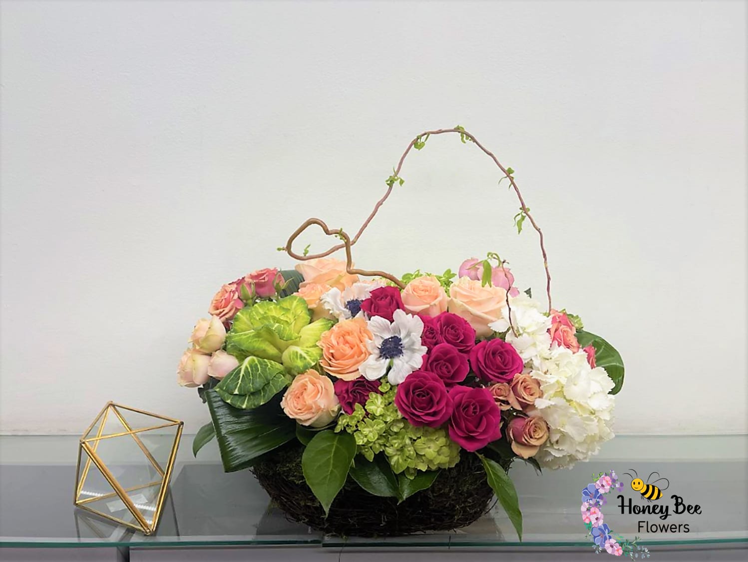 Garden Beauty - A beautiful combination colorful flowers arranged in a unique waterproof moss basket that will bring the magical feeling of a garden into the home.  Color substitutions available! Please let us know in the special instructions section during check out. 