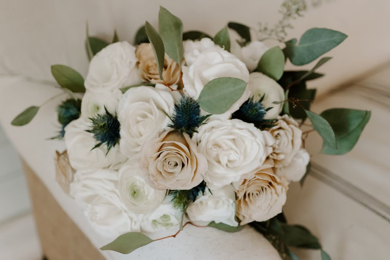 white and chocolate roses, Lisianthus with silver dollar equpalys - this bouquet has 9 white roses and 6 chocolate Roses with some white lisianthus and some purple thistle I also have a few white ranunculus.