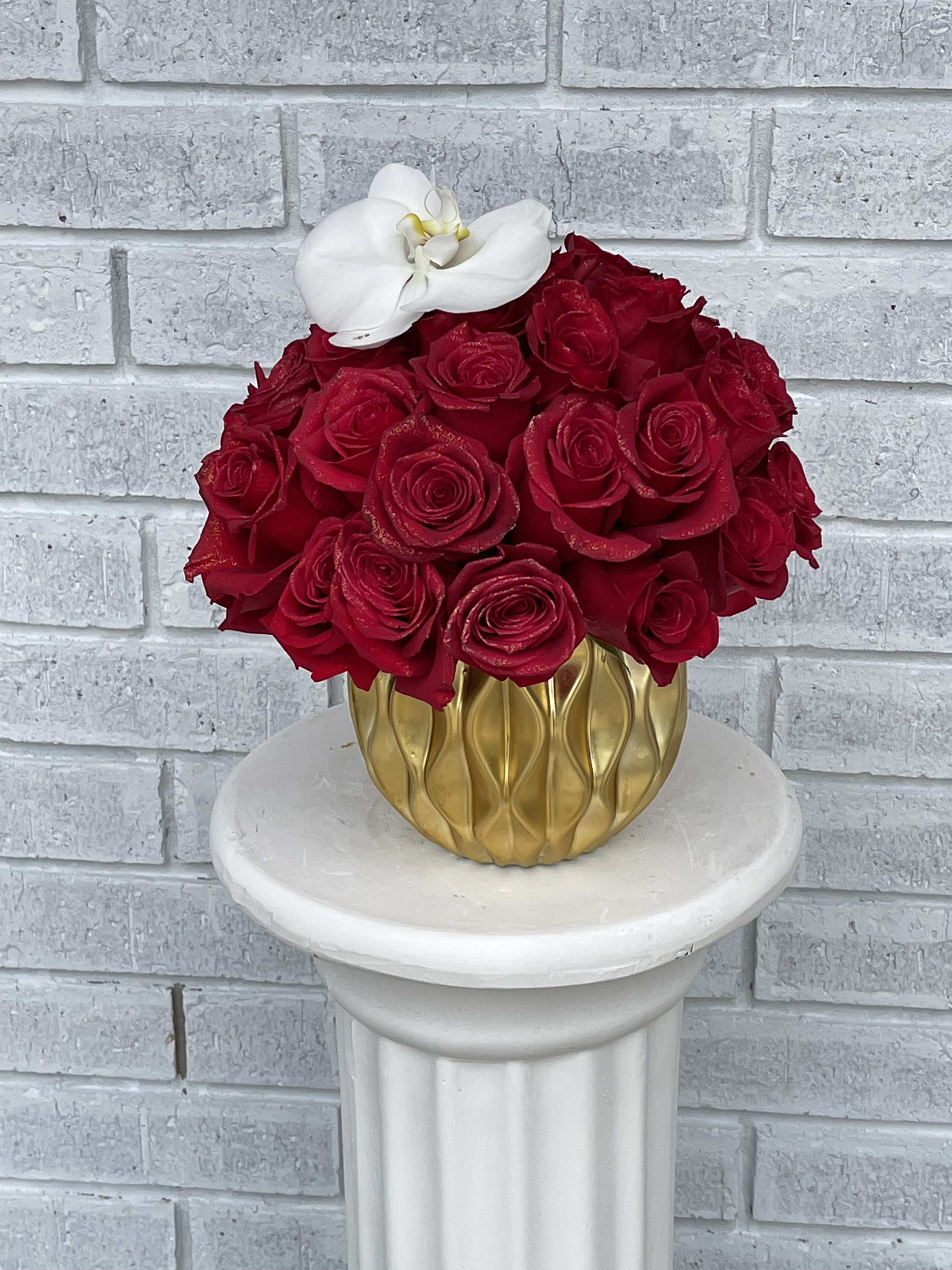 the golden love floral the golden love floral - 30-39 Ecuadorian roses in a gold ceramic nugget vase topped with a delicate white orchid