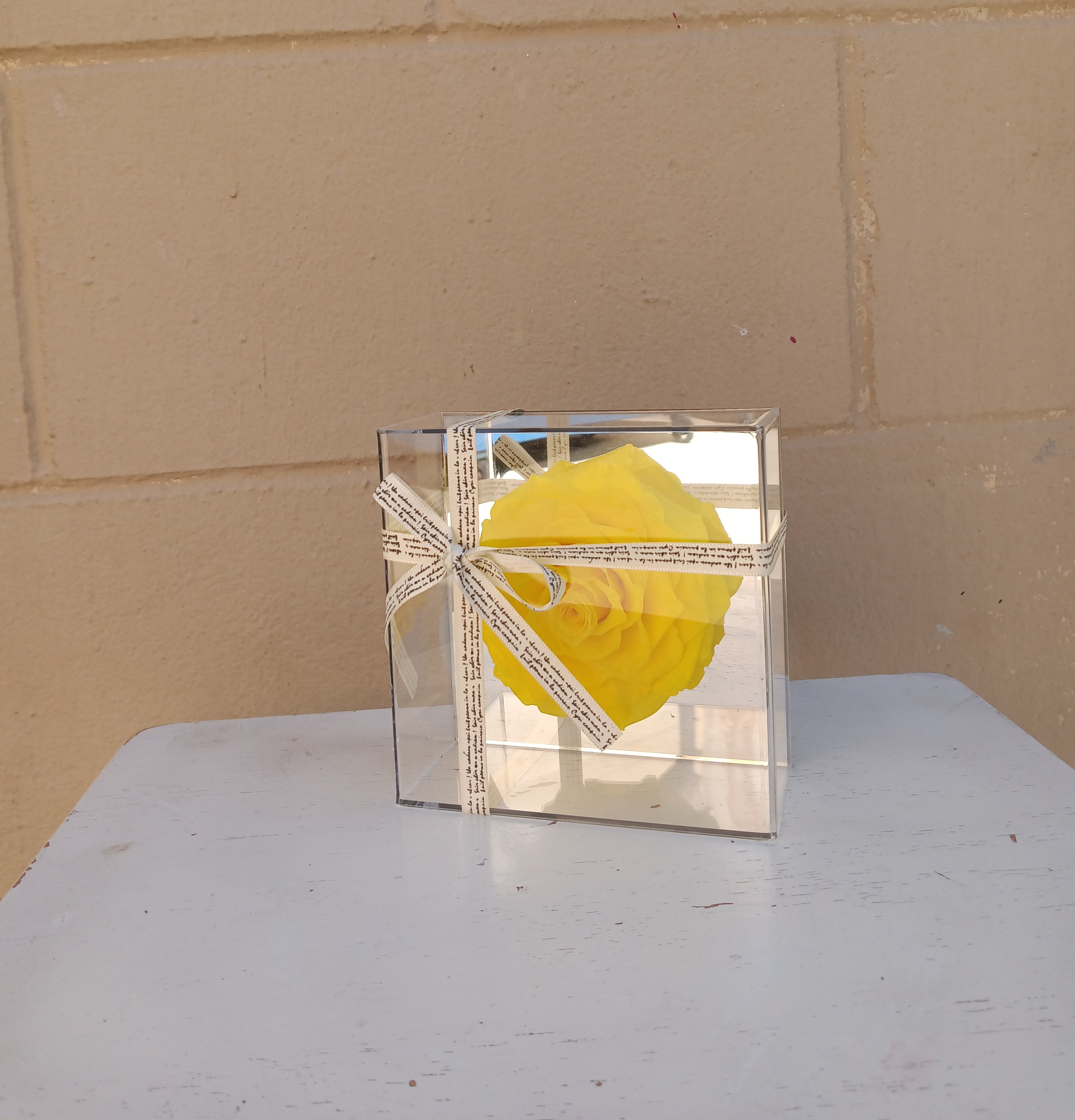 Sunshine - real roses preserved to last two plus years.   Comes in a Decorative Box