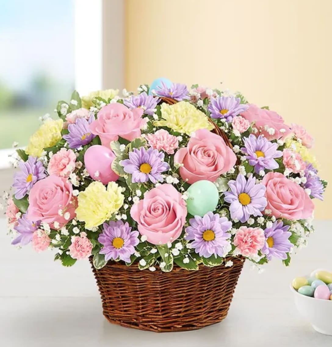 Easter Egg Basket™ - A delightful way to deliver Easter wishes. We’ve gathered fresh-picked pastel blooms and colorful eggs inside a charming handled basket. It’s a gift of instant happiness for family and friends, both near and far.