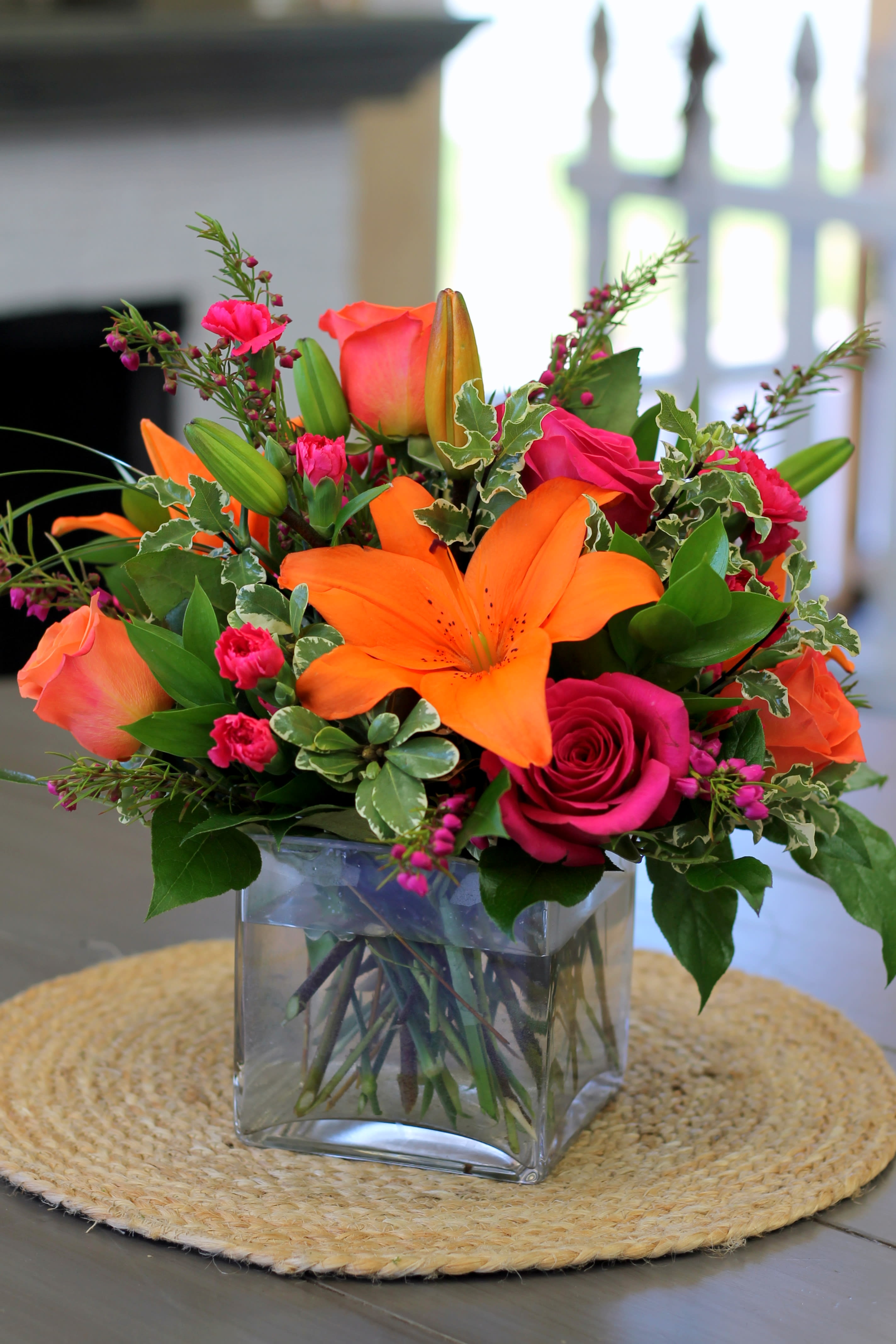 Summer Chic - What a wonderful pairing, bright orange and hot pink! Love this arrangement, as will your loved one! 