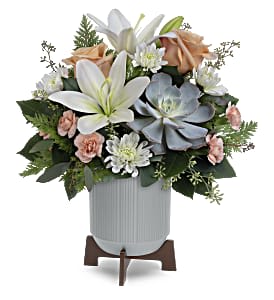 Classic Contemporary Bouquet - Sleek meets sweet! This modern arrangement pairs a sculptural succulent with soft blooms in a retro-style ceramic planter with wooden base that is filled with love.