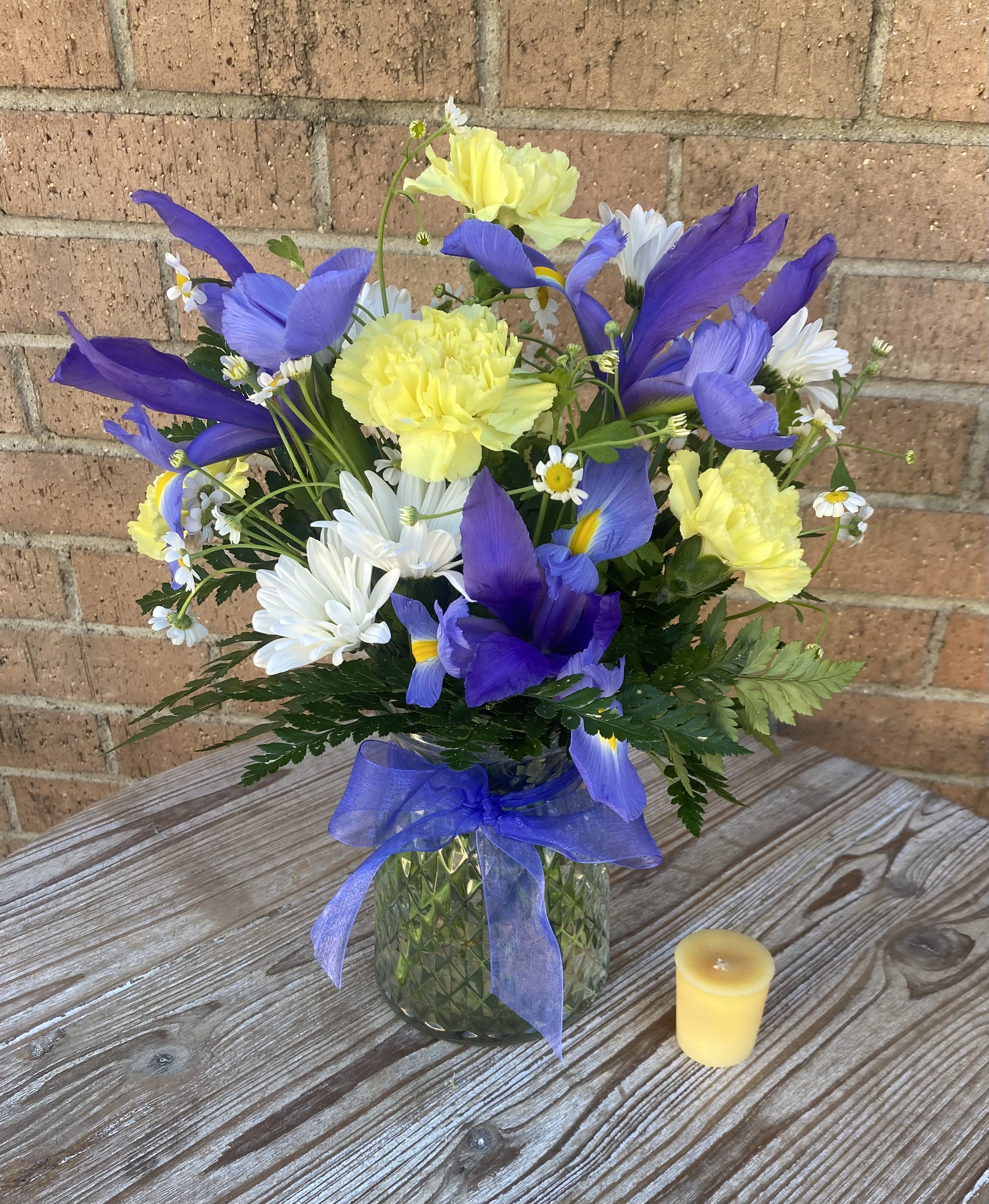 Blue Skies - Make someone's day by sending them the perfect &quot;Blue Skies&quot; arrangement. Perfect for any occasion!  (Candle not included with purchase. It is used to show size of arrangement only) 
