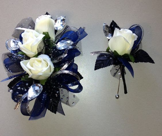 Navy Bling - White rose with large crystal accents navy and silver ribbon Bout spray rose with navy blue and black accents $15 for Bout
