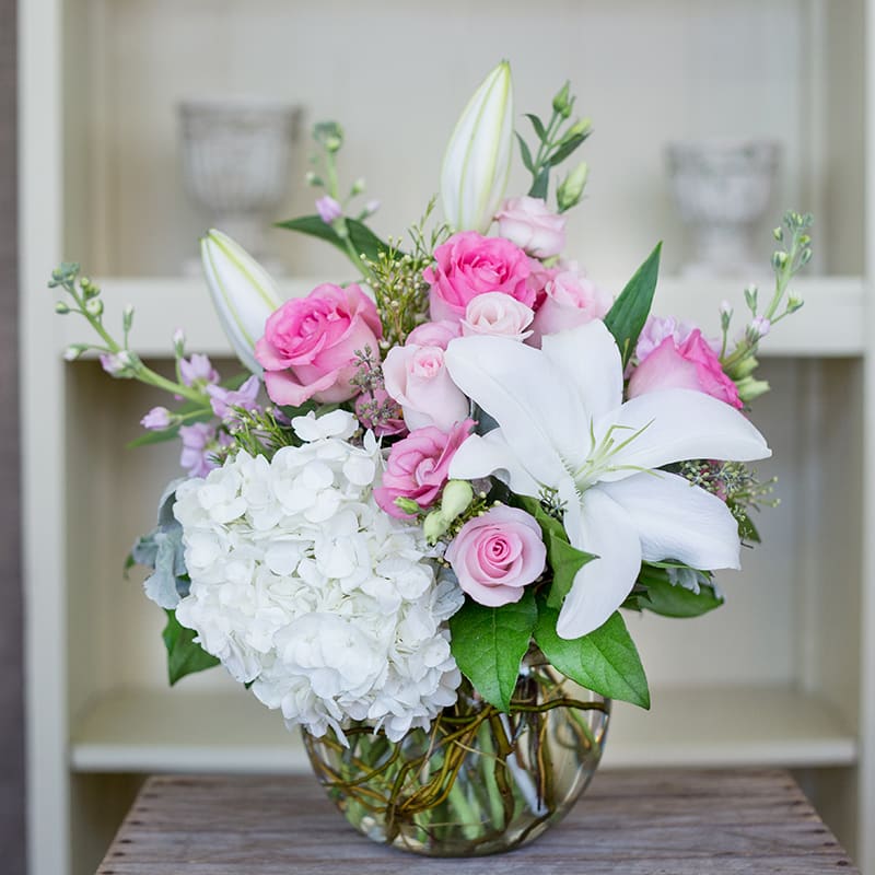 Pearls and Pink by Kokee - Pink and white flowers arranged in a compact designed bubble bowl.