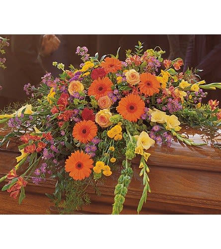 Summer Sentiments Casket Spray - TF203-2 - Express your warmest sentiments with this colorful spray of summer's brightest blooms. Each casket spray is decorated with red carnations yellow gladioli orange gerberas purple Monte Cassino asters and roses with soft foliages.Approximately 51&quot; W x 38&quot; H Orientation: All-Around As Shown : TF203-2