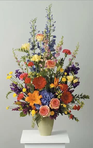 Polychromatic Stylized Vase Arrangement - Lilies, mini Carnations, gerber daisies, hydrangea freesia carnations, stock, heather, larkspur, hypericum, pomsps and delphinium