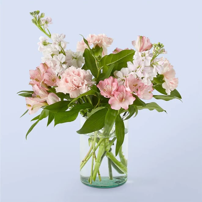 At the Ballet Bouquet - Lace your point shoes for the natural beauty of the At the Ballet Bouquet, designed with blushing pink flowers and classic white stems.  Please Note: The bouquet pictured reflects our original design for this product. While we always try to follow the color palette, we may replace stems to deliver the freshest bouquet possible, and we may sometimes need to use a different vase. DETAILS The Premium Bouquet is about 19&quot;H x 20&quot;W. Designed by florists, ready to display. For long–lasting blooms, replace the water daily. We suggest trimming the stems every couple days. Pet Safety Precautions: This bouquet or plant may include flowers and foliage that are known to be toxic to pets. To keep them safe, be sure to keep this arrangement out of your pet's reach.